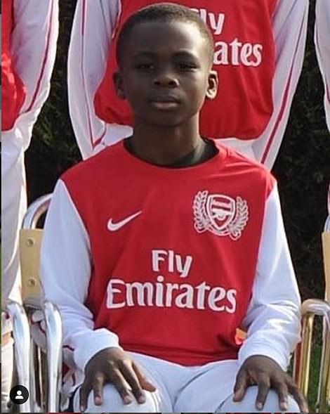 Future star Bukayo Saka pictured as a youngster playing for Arsenal's academy