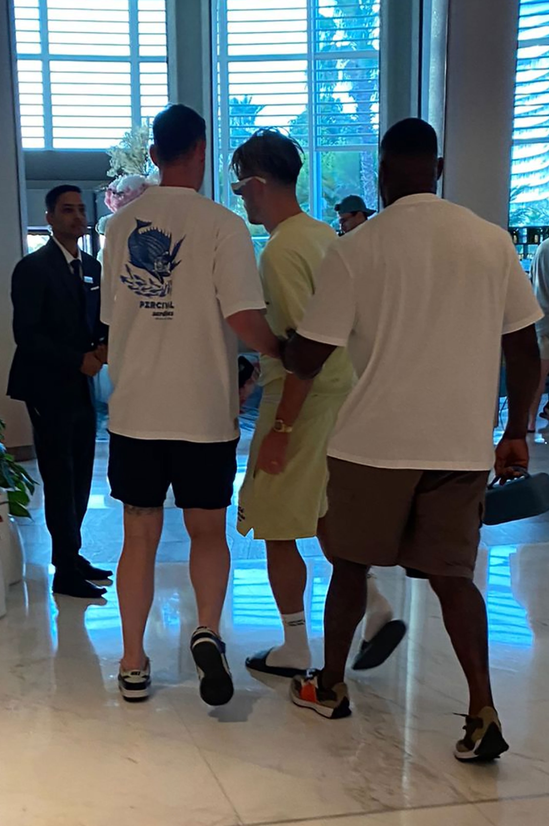 Jack Grealish needed a helping hand as he walked through a luxury hotel at 6.30pm