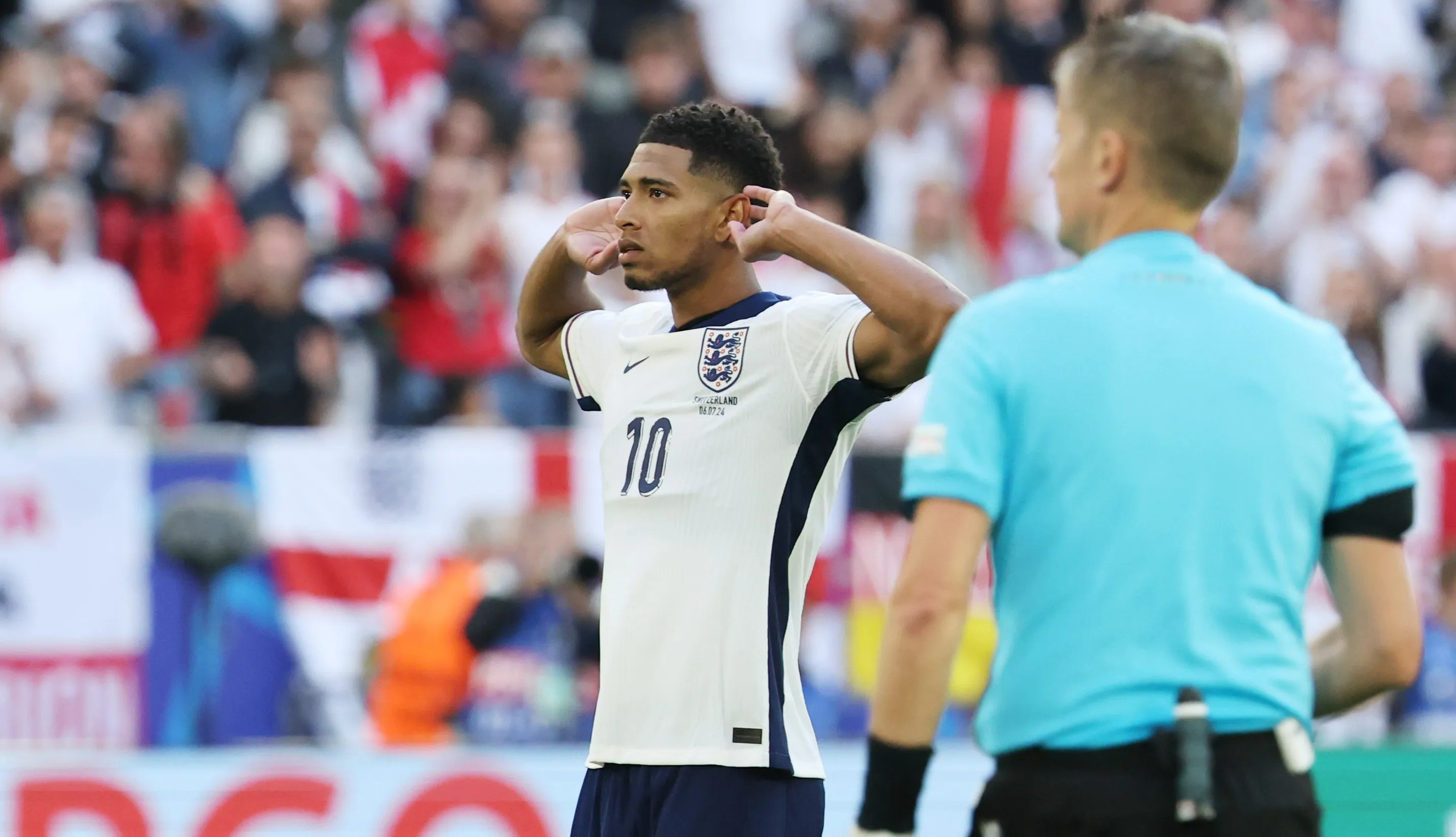 Bellingham held his ears to the crowd after scoring his penalty