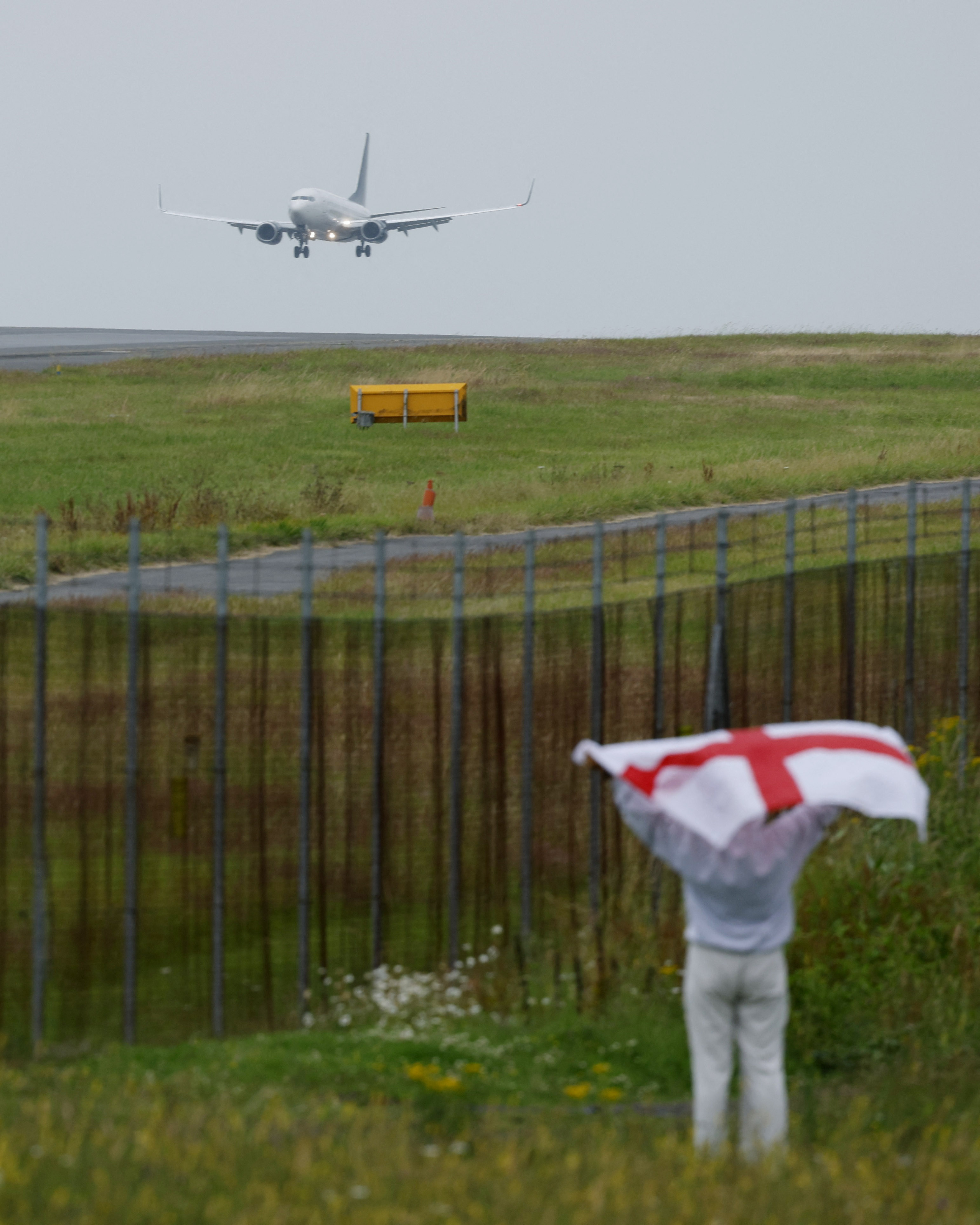 An England fan went to wave support to England's returning stars