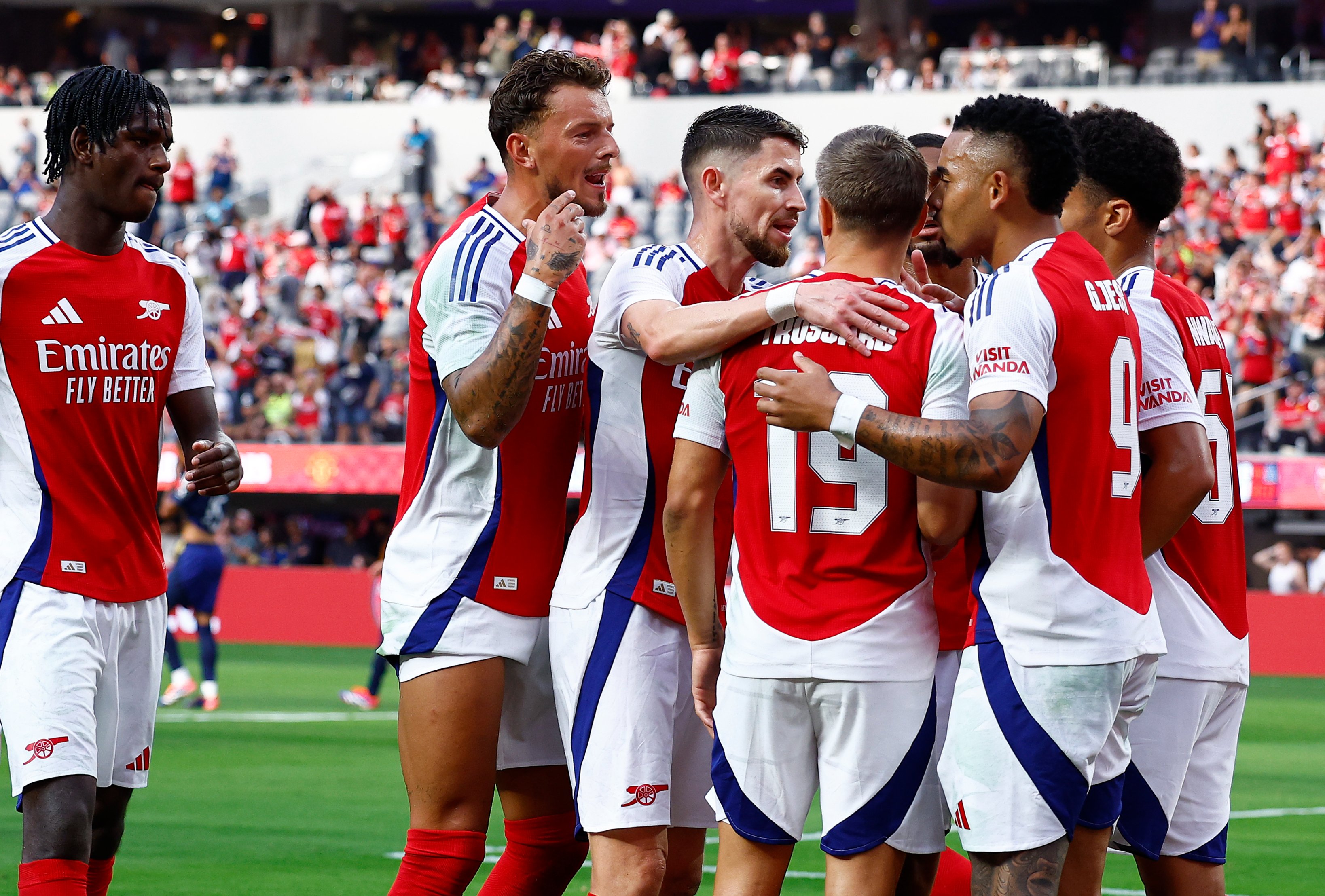 The Arsenal players celebrate. 