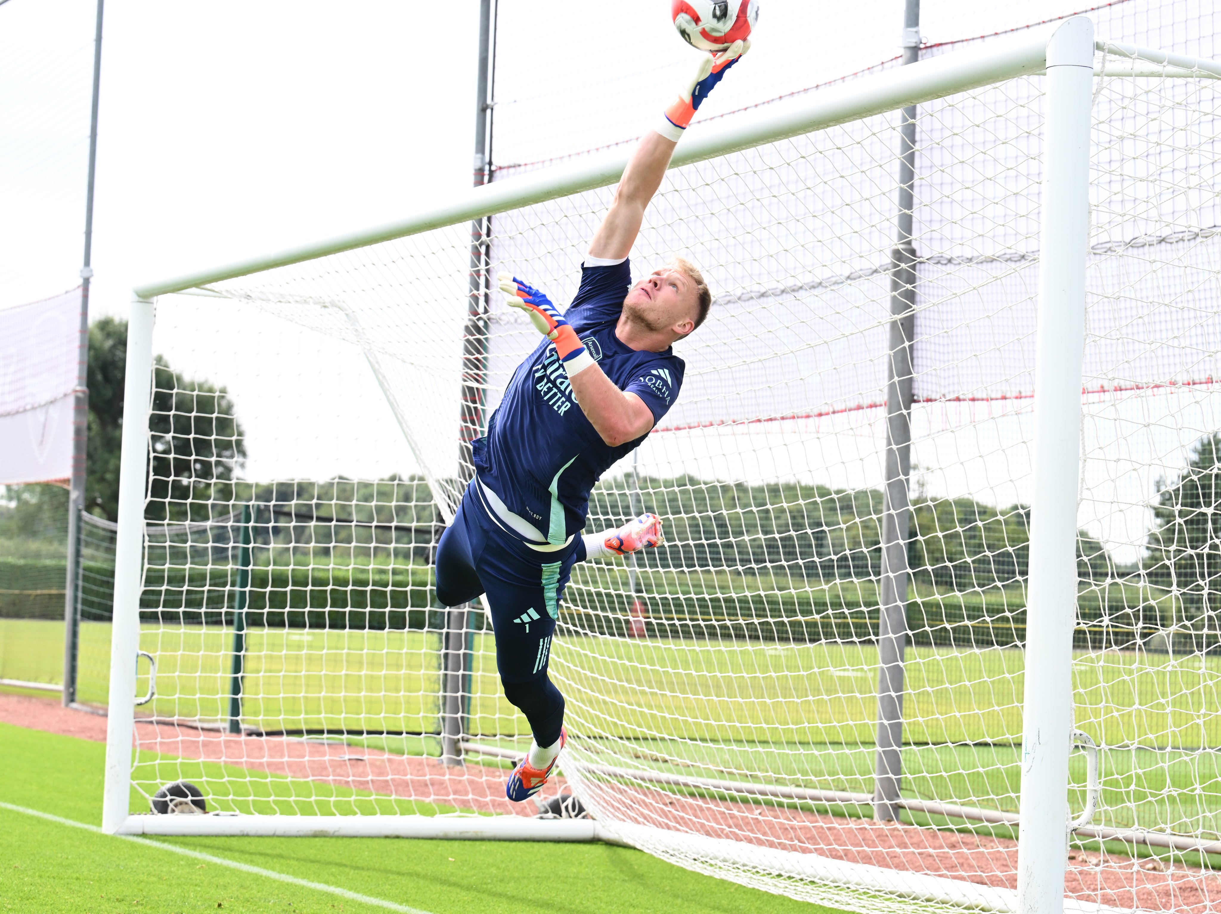 Aaron Ramsdale makes a save at the Sobha Realty Training Centre.