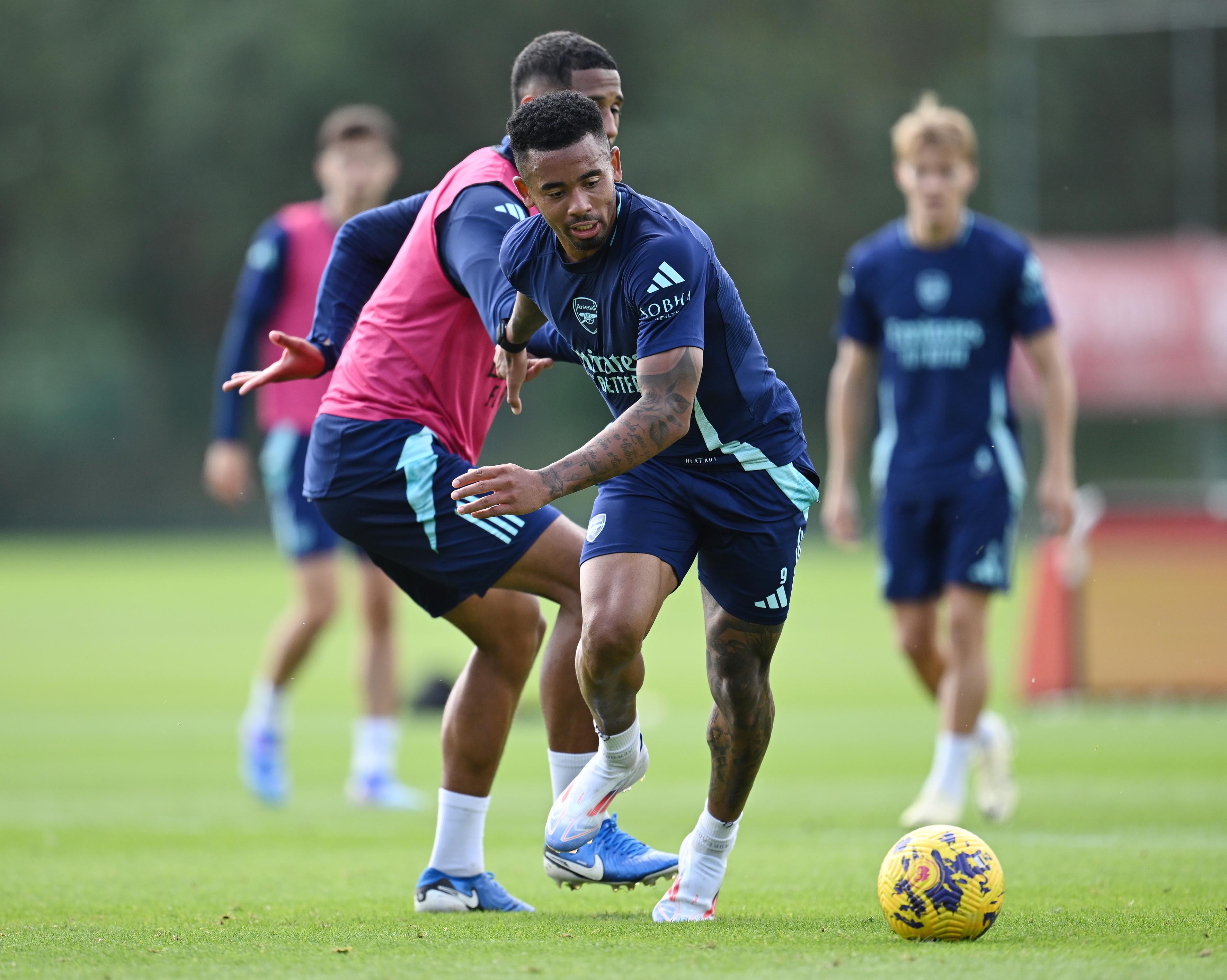 Gabriel Jesus takes on William Saliba in Arsenal training