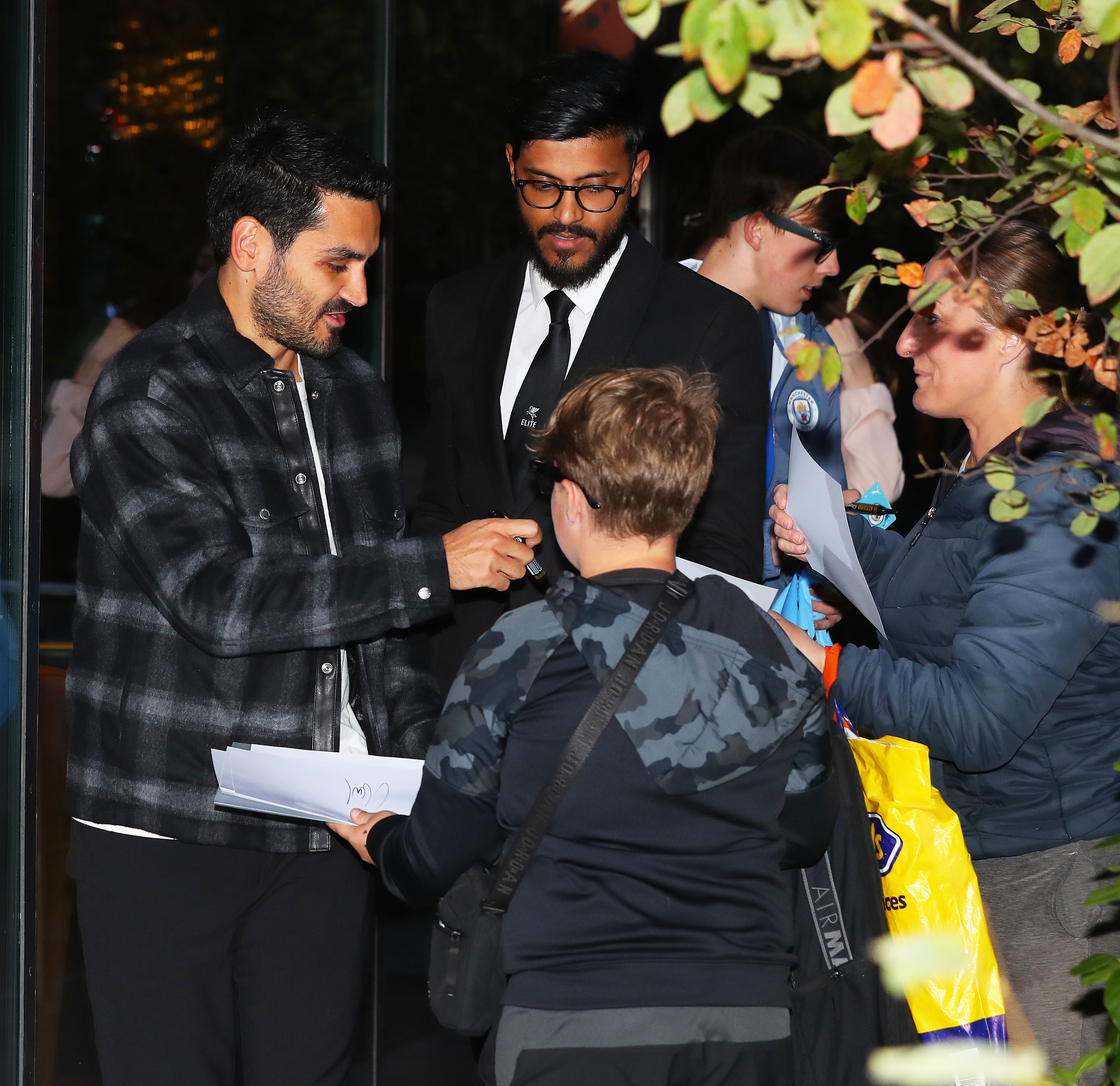 Gundogan signed autographs for fans as he prepares to complete a free transfer from Barcelona