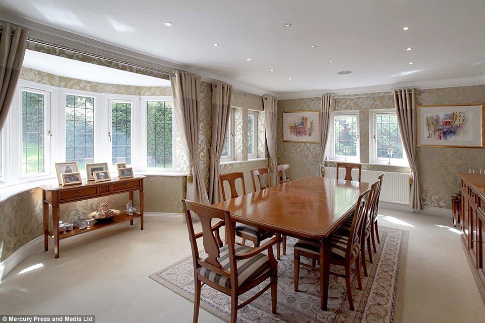 The elegant dining room, which is light and airy, includes a top of the range table for up eight guests