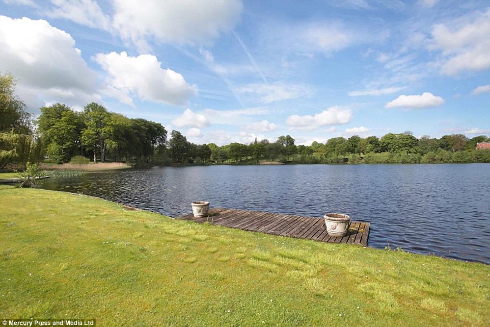 If Stones wants to try out watersports he has easy access to this beautiful lake which overlooks the Cheshire property 