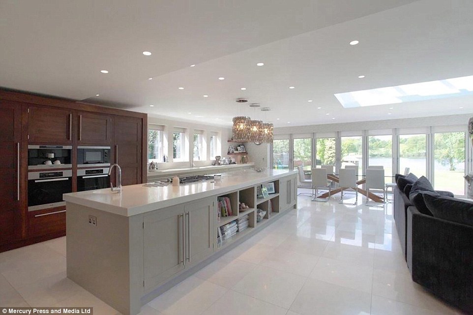 The kitchen is well stocked for wannabe chefs as it includes two double ovens and a large number of storage spaces